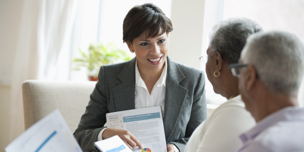 o-AFRICANAMERICAN-COUPLE-WITH-FINANCIAL-PLANNER-facebook - Copy